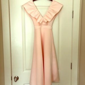 Light pink v-neck midi dress perfect for events